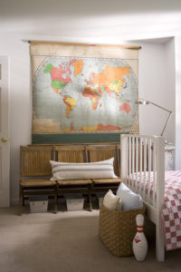 Teen bedroom with a world map poster