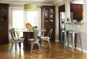 Stacked stock cabinets in a modern dining room