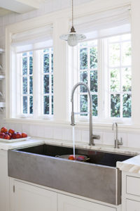 sink with a single bowl and long neck faucet